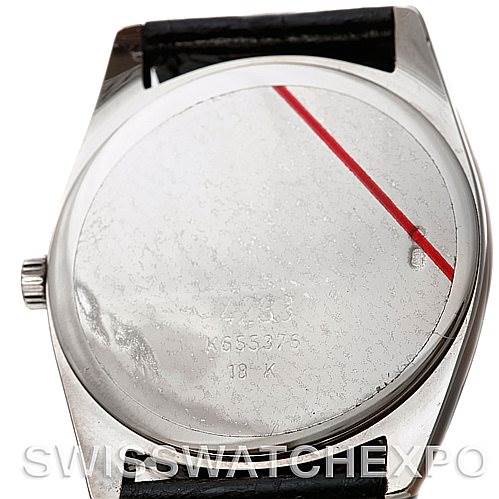 This image shows the back case of a Rolex Cellini 4233 Men's White Gold Black Dial 4233 Men's White Gold Black Dial model watch, including the crown and part of the strap, from a slightly angled bottom view.