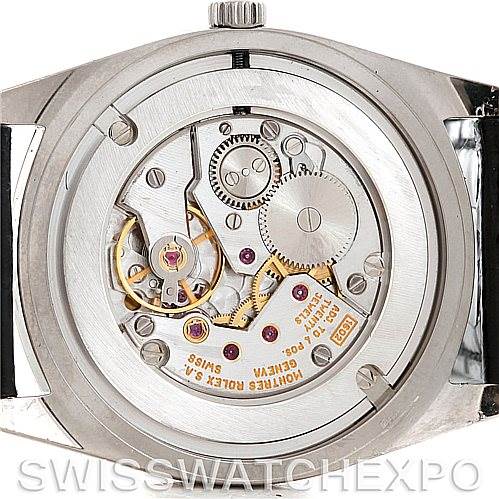 The image shows the back view of a Rolex Cellini 4233 Men's White Gold Black Dial 4233 Men's White Gold Black Dial watch, revealing its internal mechanical movement and components.