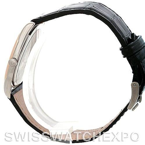 This image shows a side profile view of the Rolex Cellini 4233 Men's White Gold Black Dial 4233 Men's White Gold Black Dial watch, highlighting its case, crown, and leather strap.