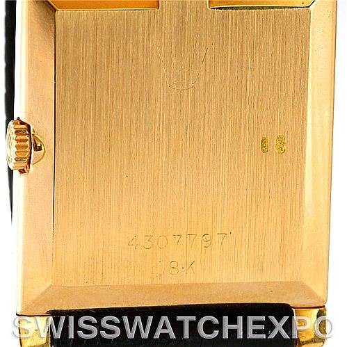 This image shows the back of a gold Rolex Cellini 4105 Men's Yellow Gold Black Dial 4105 Men's Yellow Gold Black Dial watch with the serial number visible.