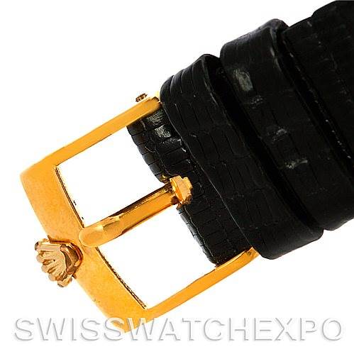 The image shows a close-up view of the gold buckle and black leather strap of a Rolex Cellini 4105 Men's Yellow Gold Black Dial 4105 Men's Yellow Gold Black Dial watch.