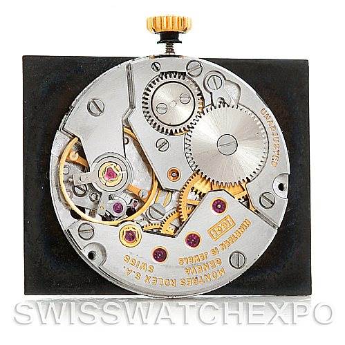 The image shows the internal movement mechanism of a Rolex Cellini 4105 Men's Yellow Gold Black Dial 4105 Men's Yellow Gold Black Dial watch from a top-down angle.
