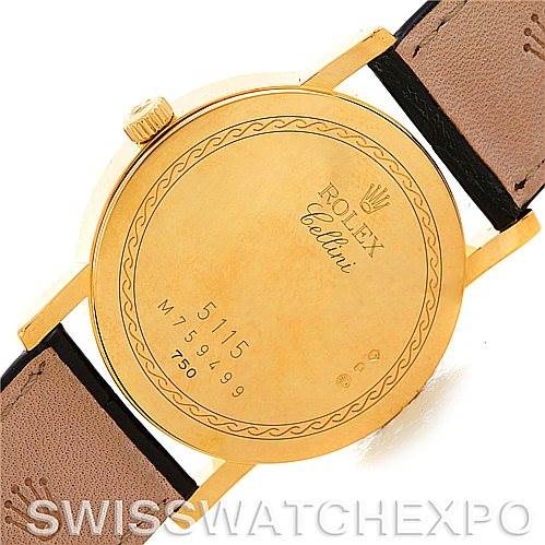 The image shows the back of a Rolex Cellini 5115 Men's Yellow Gold Beige Dial 5115 Men's Yellow Gold Beige Dial watch case, displaying the model number, branding, and leather straps.