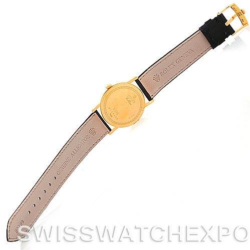 The image shows the back view of a Rolex Cellini 5115 Men's Yellow Gold Beige Dial 5115 Men's Yellow Gold Beige Dial watch, highlighting its leather strap and gold buckle.