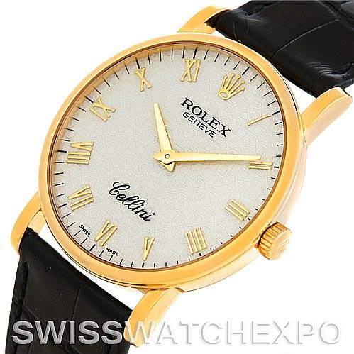 This image shows a Rolex Cellini 5115 Men's Yellow Gold Beige Dial 5115 Men's Yellow Gold Beige Dial watch from a slightly angled top view, displaying the dial, gold case, crown, and black leather strap.