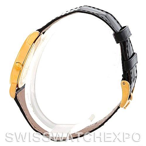 The image shows a side profile view of a Rolex Cellini 5115 Men's Yellow Gold Beige Dial 5115 Men's Yellow Gold Beige Dial watch, highlighting its gold case and black leather strap.