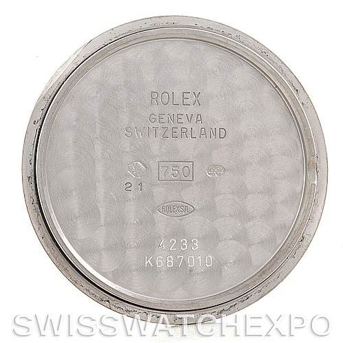The image shows the inside of the case back for a Rolex Cellini 4233 Men's White Gold Black Dial 4233 Men's White Gold Black Dial watch, with inscriptions indicating its authenticity and origin.
