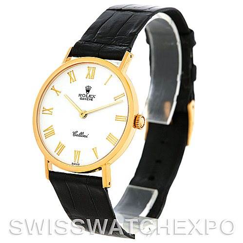The image shows a Rolex Cellini 5112 Men
s Yellow Gold White Dial 5112 Men
s Yellow Gold White Dial model from a front angle, highlighting its gold case, white dial with Roman numerals, and black leather strap.