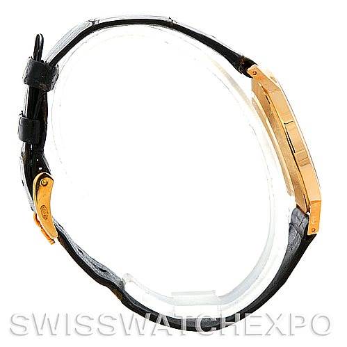 The image shows a side profile of a Rolex Cellini 5112 Men
s Yellow Gold White Dial 5112 Men
s Yellow Gold White Dial watch, featuring the case, crown, and strap.