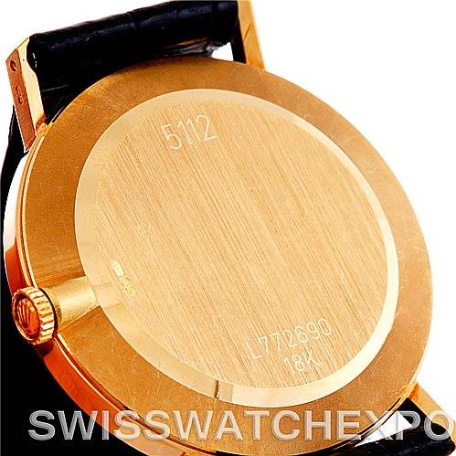 This image shows the back case and crown of a Rolex Cellini 5112 Men
s Yellow Gold White Dial 5112 Men
s Yellow Gold White Dial watch, viewed from a rear angle.