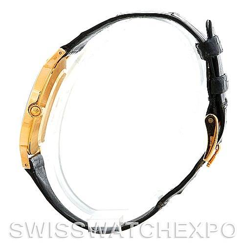 The image shows a side view of a Rolex Cellini 5112 Men
s Yellow Gold White Dial 5112 Men
s Yellow Gold White Dial watch, highlighting the crown, case, and strap.