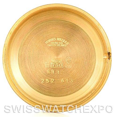 This is the inner case back of a Rolex Cellini 5112 Men
s Yellow Gold White Dial 5112 Men
s Yellow Gold White Dial watch, showing the brand
s engravings and model numbers.