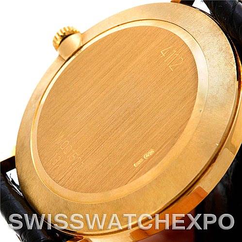 The image shows the back of a Rolex Cellini 4112 Men's Yellow Gold White Dial 4112 Men's Yellow Gold White Dial watch, highlighting the gold case and crown.