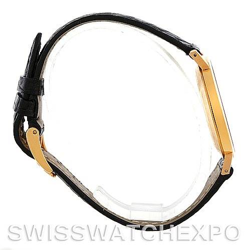 The image shows a side view of a Rolex Cellini 4112 Men's Yellow Gold White Dial 4112 Men's Yellow Gold White Dial watch, highlighting its case, strap, and buckle.