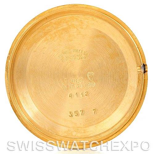 This image shows the inside case back of a Rolex Cellini 4112 Men's Yellow Gold White Dial 4112 Men's Yellow Gold White Dial watch, displaying hallmarks and reference numbers.