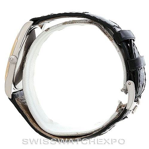 The image shows a side profile view of the Rolex Cellini 4233 Men's White Gold Black Dial 4233 Men's White Gold Black Dial watch, showcasing its case, crown, and leather strap.