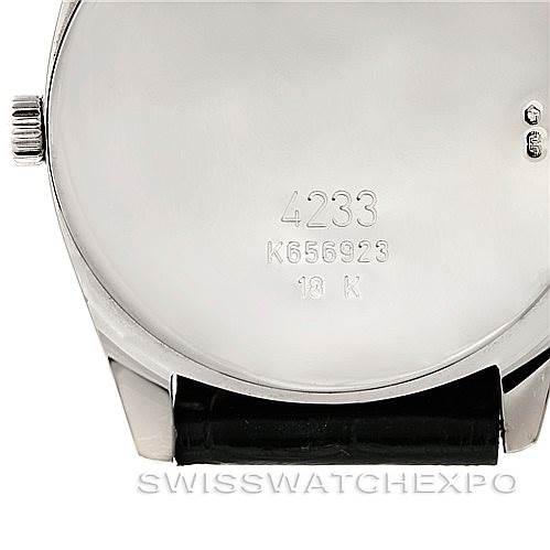 This image shows the back case, crown, and strap lugs of a Rolex Cellini 4233 Men's White Gold Black Dial 4233 Men's White Gold Black Dial model watch.