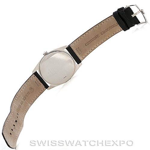 The image shows the back side of a Rolex Cellini 4233 Men's White Gold Black Dial 4233 Men's White Gold Black Dial watch with its leather strap fully extended.