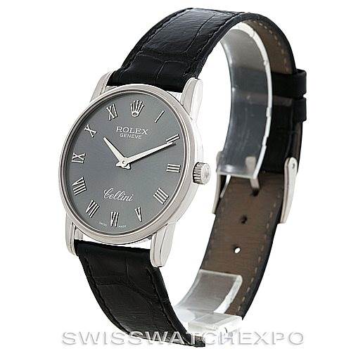 The Rolex Cellini 5116 Men's White Gold Grey Dial 5116 Men's White Gold Grey Dial watch is shown at an angle displaying its face, watch case, crown, and leather strap.