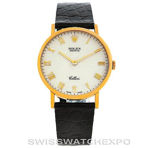 The image shows a front view of a Rolex Cellini 5112 Men's Yellow Gold Beige Dial 5112 Men's Yellow Gold Beige Dial watch featuring a white dial, gold case, and black leather strap.