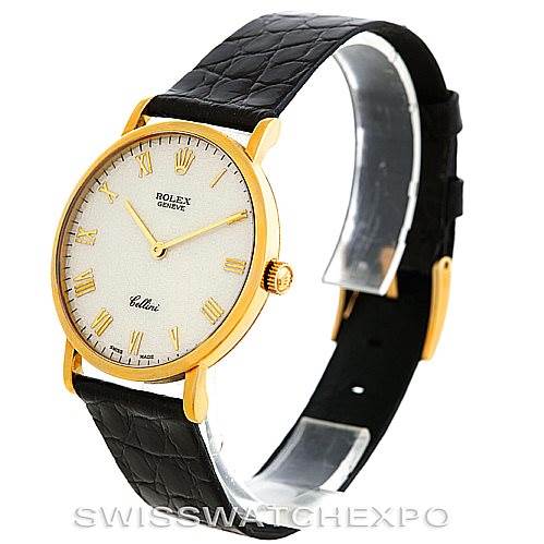 This is a side-angle view of a Rolex Cellini 5112 Men's Yellow Gold Beige Dial 5112 Men's Yellow Gold Beige Dial watch, showing the face, leather strap, and gold case.