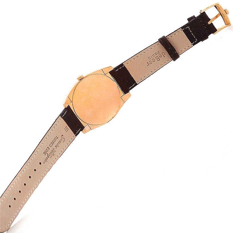 The image shows the back view of a Cellini model watch by Rolex, displaying the strap and case back.