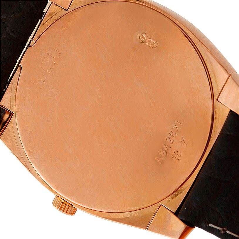The image shows the back case of a Rolex Cellini 5330 Men's Rose Gold Grey Dial 5330 Men's Rose Gold Grey Dial watch, including the crown and leather strap ends.