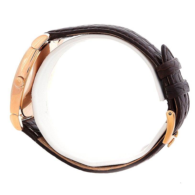 This image shows the side view of a Rolex Cellini 5330 Men's Rose Gold Grey Dial 5330 Men's Rose Gold Grey Dial watch, highlighting the crown, case, and leather strap.