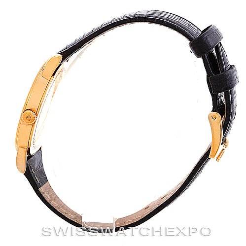 The image shows a side profile of a Rolex Cellini 5115 Men's Yellow Gold Beige Dial 5115 Men's Yellow Gold Beige Dial watch, highlighting the crown, case, and leather strap.