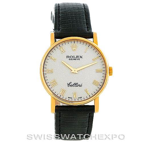 This Rolex Cellini 5115 Men's Yellow Gold Beige Dial 5115 Men's Yellow Gold Beige Dial watch is shown from the front, highlighting its gold case, white dial with Roman numerals, and black leather strap.