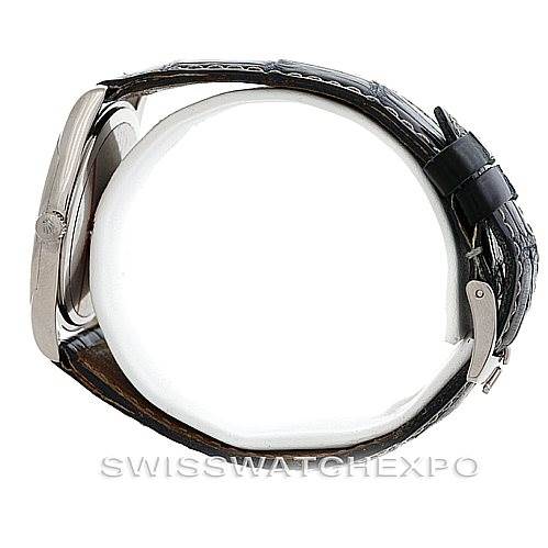 This image shows a Rolex Cellini 4233 Men's White Gold White Dial 4233 Men's White Gold White Dial watch from a side angle, highlighting the case, bezel, crown, and leather strap with a buckle.