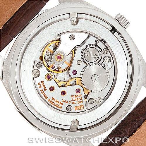 The image shows the back of a Rolex Cellini 4233 Men's White Gold Black Dial 4233 Men's White Gold Black Dial watch, highlighting its inner mechanical movement.