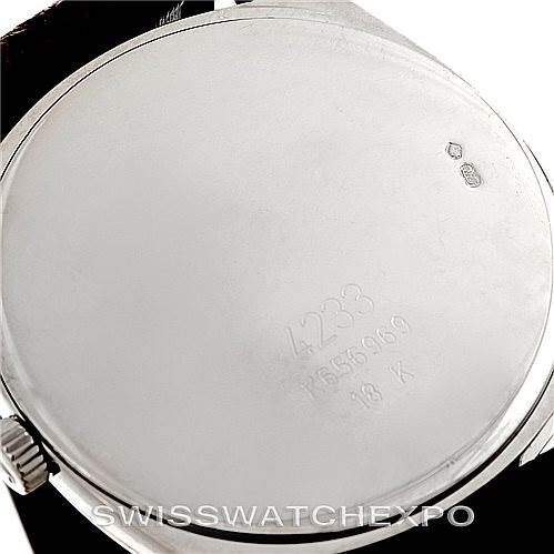 This image shows the back case of a Rolex Cellini 4233 Men's White Gold Black Dial 4233 Men's White Gold Black Dial watch, viewed from a slightly angled perspective, with visible engravings and hallmarks.