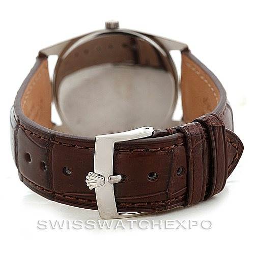 This image shows the back of the Rolex Cellini 4233 Men's White Gold Black Dial 4233 Men's White Gold Black Dial watch and its brown leather strap, focused on the clasp and buckle.