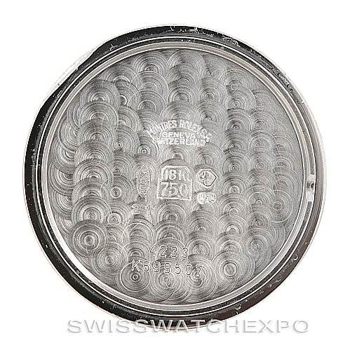 This image shows the inside case back of a Rolex Cellini 4233 Men's White Gold White Dial 4233 Men's White Gold White Dial watch, featuring engravings and hallmark details.