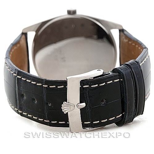 The image shows the back view of a Rolex Cellini 4233 Men's White Gold White Dial 4233 Men's White Gold White Dial watch focused on its leather strap and clasp.