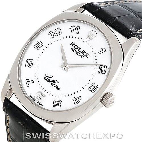 This image shows a close-up, angled view of the Rolex Cellini 4233 Men's White Gold White Dial 4233 Men's White Gold White Dial watch, showcasing the dial, hour markers, crown, and part of the leather strap.
