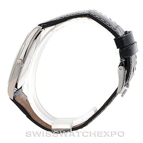 This Rolex Cellini 4233 Men's White Gold White Dial 4233 Men's White Gold White Dial watch is shown from the side, highlighting the case, crown, and black leather strap.