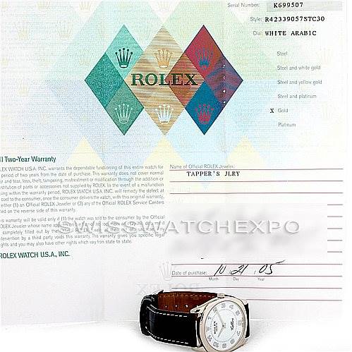 The image shows a Rolex Cellini 4233 Men's White Gold White Dial 4233 Men's White Gold White Dial watch at an angled view, accompanied by its warranty card and retail purchase documentation.