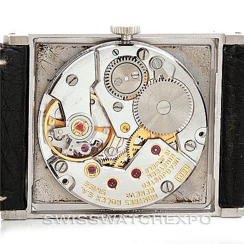 This image shows the movement and internal mechanism of a Rolex Cellini 4014 Men
s White Gold Silver Dial 4014 Men
s White Gold Silver Dial watch from a back angle.