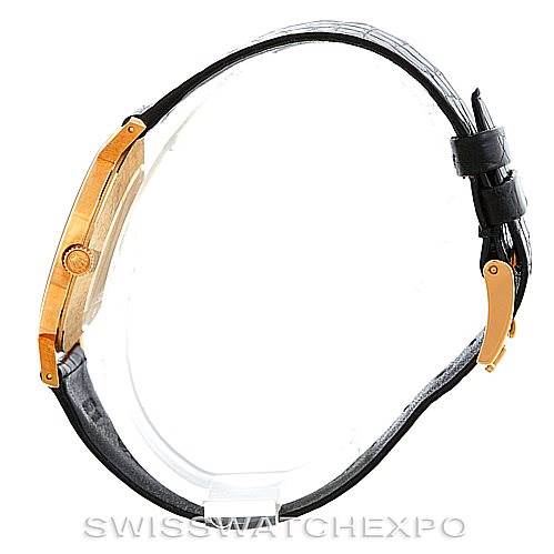 The image shows a side view of the Rolex Cellini 4112 Men's Yellow Gold White Dial 4112 Men's Yellow Gold White Dial watch, highlighting its slim profile, side crown, and leather watch strap.