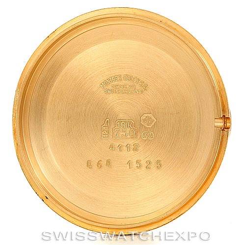 This image shows the interior of the case back of a Rolex Cellini 4112 Men's Yellow Gold White Dial 4112 Men's Yellow Gold White Dial watch, featuring gold purity and maker's marks.
