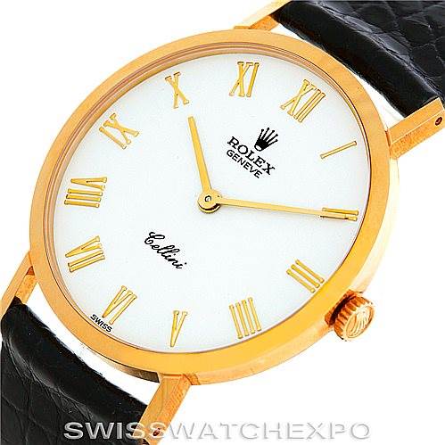 This image shows a close-up of the Rolex Cellini 4112 Men's Yellow Gold White Dial 4112 Men's Yellow Gold White Dial watch, highlighting the dial, gold case, Roman numerals, and black leather strap.