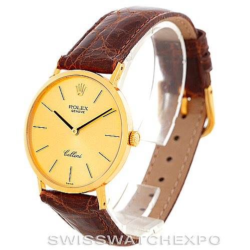 This image shows a Rolex Cellini 4112 Men's Yellow Gold Champagne Dial 4112 Men's Yellow Gold Champagne Dial watch at an angle revealing the front dial, case, and brown leather strap.