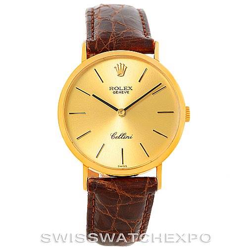 The image shows a front view of a Rolex Cellini 4112 Men's Yellow Gold Champagne Dial 4112 Men's Yellow Gold Champagne Dial watch with a gold case, brown leather strap, and gold dial.