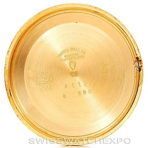 This image shows the inner side of the case back of a Rolex Cellini 4112 Men's Yellow Gold Champagne Dial 4112 Men's Yellow Gold Champagne Dial watch, displaying various engravings and hallmarks.