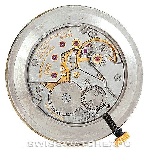 This image shows the movement of the Rolex Cellini 4112 Men's Yellow Gold Champagne Dial 4112 Men's Yellow Gold Champagne Dial watch, viewed from the back, revealing its internal mechanism.