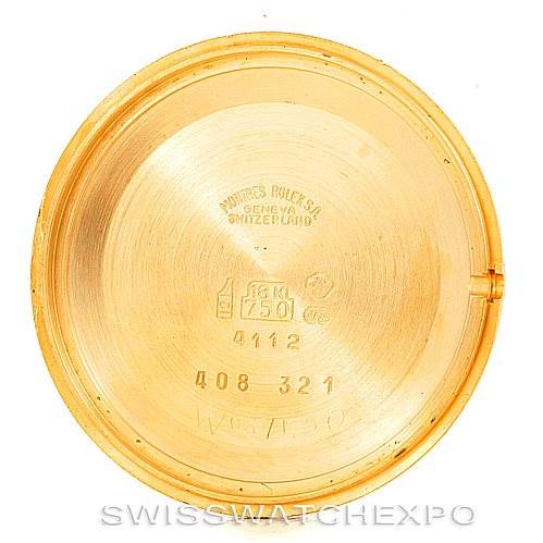 The image shows the inside case back of a Rolex Cellini 4112 Men's Yellow Gold Champagne Dial 4112 Men's Yellow Gold Champagne Dial model, with the brand and specifications engraved.