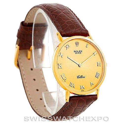 The image shows a Rolex Cellini 4112 Men's Yellow Gold Champagne Dial 4112 Men's Yellow Gold Champagne Dial watch from a front-left angle, including the face, casing, and brown leather strap.