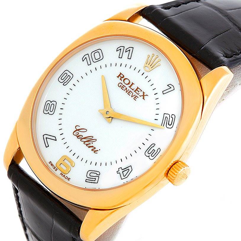 The image shows a close-up of the Rolex Cellini 4233 Men's Yellow Gold White Dial 4233 Men's Yellow Gold White Dial watch face, crown, and part of the leather strap at an angled top-down view.